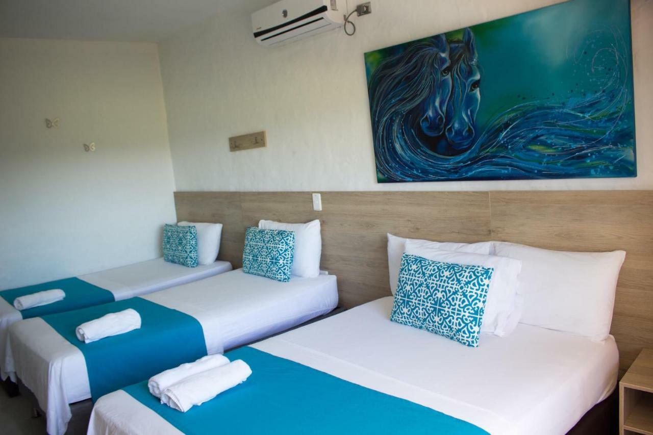 Hotel Aldea Plaza Doradal Bagian luar foto