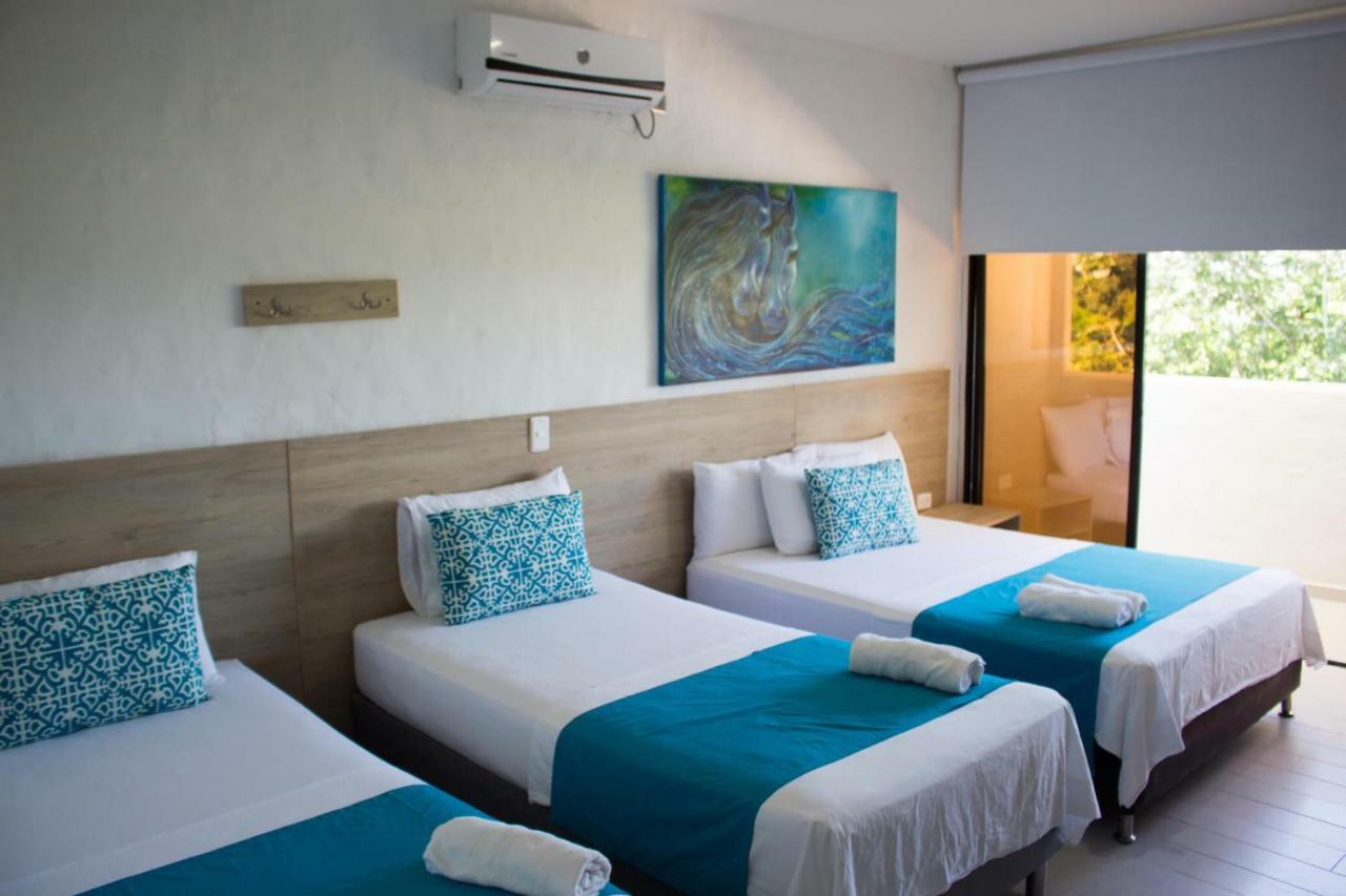 Hotel Aldea Plaza Doradal Bagian luar foto
